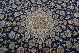 Central medallion detail of 2000s Kashan rug from Iran / Persia