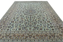 Surface texture of 2000s Kashan rug with natural Wool and intricate pattern