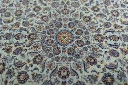 Central medallion detail of 2000s Kashan rug from Iran / Persia