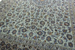 Close-up detail of 2000s Kashan rug from Iran / Persia showing Wool weave
