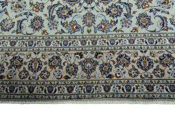 Full view of 2000s Kashan rug from Iran / Persia, 412 × 298 cm in Green tones