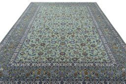 Surface texture of 2000s Kashan rug with natural Wool and intricate pattern