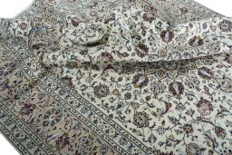 Surface texture of 2000s Kashan rug with natural Wool and intricate pattern