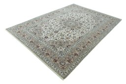 Corner detail of 2000s Kashan rug showing border pattern and Wool pile