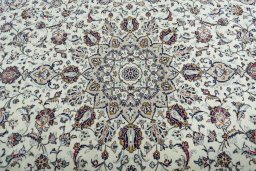 Central medallion detail of 2000s Kashan rug from Iran / Persia