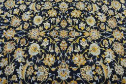 Central medallion detail of 2000s Kashan rug from Iran / Persia