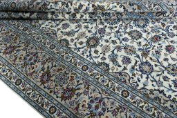 Close-up detail of 2000s Kashan rug from Iran / Persia showing Wool weave