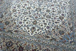 Close-up detail of 2000s Kashan rug from Iran / Persia showing Wool weave