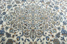 Central medallion detail of 2000s Kashan rug from Iran / Persia