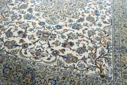 Close-up detail of 2000s Kashan rug from Iran / Persia showing Wool weave
