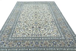 Surface texture of 2000s Kashan rug with natural Wool and intricate pattern