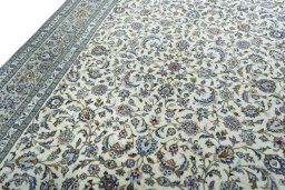 Backside of handmade 2000s Kashan rug showing knot structure and weave density