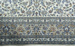 Full view of 2000s Kashan rug from Iran / Persia, 360 × 247 cm in Beige tones
