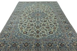Surface texture of 2000s Kashan rug with natural Wool and intricate pattern
