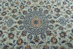 Central medallion detail of 2000s Kashan rug from Iran / Persia