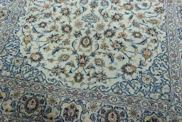Close-up detail of 2000s Kashan rug from Iran / Persia showing Wool weave