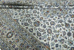 Close-up detail of 2000s Kashan rug from Iran / Persia showing Wool weave