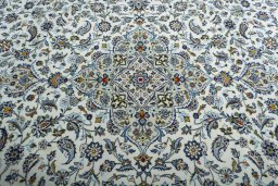 Central medallion detail of 2000s Kashan rug from Iran / Persia