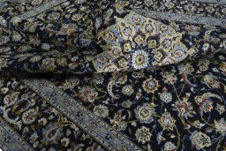 Surface texture of 1970s Kashan rug with natural Wool and intricate pattern