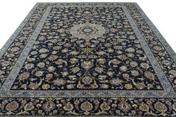 Surface texture of 1970s Kashan rug with natural Wool and intricate pattern
