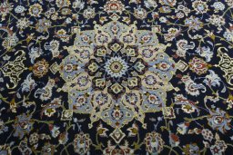 Central medallion detail of 1970s Kashan rug from Iran / Persia