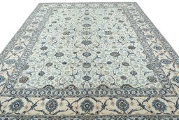 Surface texture of 2000s Kashan rug with natural Wool and intricate pattern
