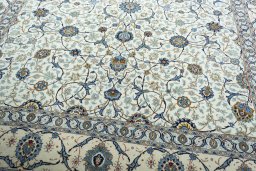 Close-up detail of 2000s Kashan rug from Iran / Persia showing Wool weave