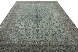 Surface texture of 2000s Kashan rug with natural Wool and intricate pattern