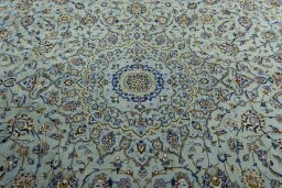Central medallion detail of 2000s Kashan rug from Iran / Persia