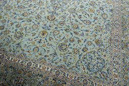 Close-up detail of 2000s Kashan rug from Iran / Persia showing Wool weave