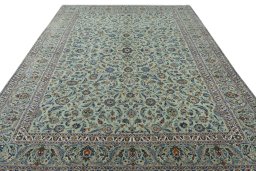 Surface texture of 1970s Kashan rug with natural Wool and intricate pattern