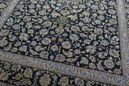 Close-up detail of New Kashan rug from Iran / Persia showing Wool weave