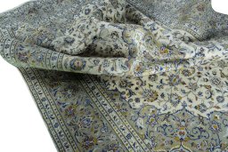 Surface texture of 2000s Kashan rug with natural Wool and intricate pattern