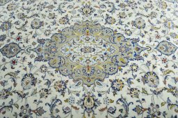 Central medallion detail of 2000s Kashan rug from Iran / Persia