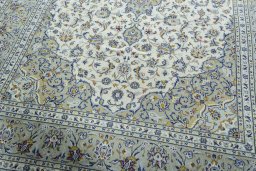 Close-up detail of 2000s Kashan rug from Iran / Persia showing Wool weave