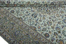 Close-up detail of 2000s Kashan rug from Iran / Persia showing Wool weave