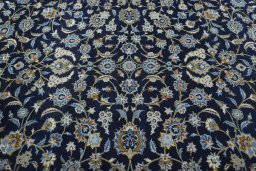 Central medallion detail of 2000s Kashan rug from Iran / Persia