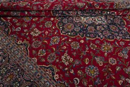 Close-up detail of 2000s Kashan rug from Iran / Persia showing Wool weave