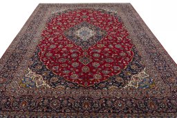 Surface texture of 2000s Kashan rug with natural Wool and intricate pattern