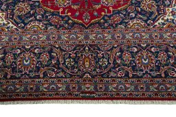 Full view of 2000s Kashan rug from Iran / Persia, 423 × 298 cm in Red tones