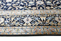 Central medallion detail of 2000s Kashan rug from Iran / Persia