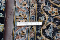 Close-up detail of 2000s Kashan rug from Iran / Persia showing Wool weave
