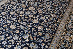 Central medallion detail of 2000s Kashan rug from Iran / Persia