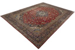 Corner detail of 2000s Kashan rug showing border pattern and Wool pile