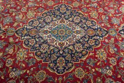 Central medallion detail of 2000s Kashan rug from Iran / Persia