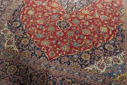 Close-up detail of 2000s Kashan rug from Iran / Persia showing Wool weave