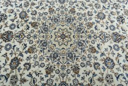 Central medallion detail of 2000s Kashan rug from Iran / Persia