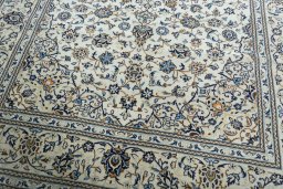 Close-up detail of 2000s Kashan rug from Iran / Persia showing Wool weave