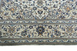 Full view of 2000s Kashan rug from Iran / Persia, 303 × 201 cm in Beige tones