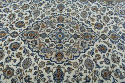 Central medallion detail of 2000s Kashan rug from Iran / Persia
